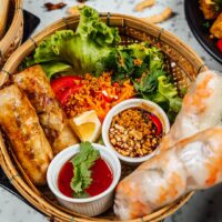 delicious-vietnamese-food-including-pho-ga-noodles-spring-rolls-white-wall